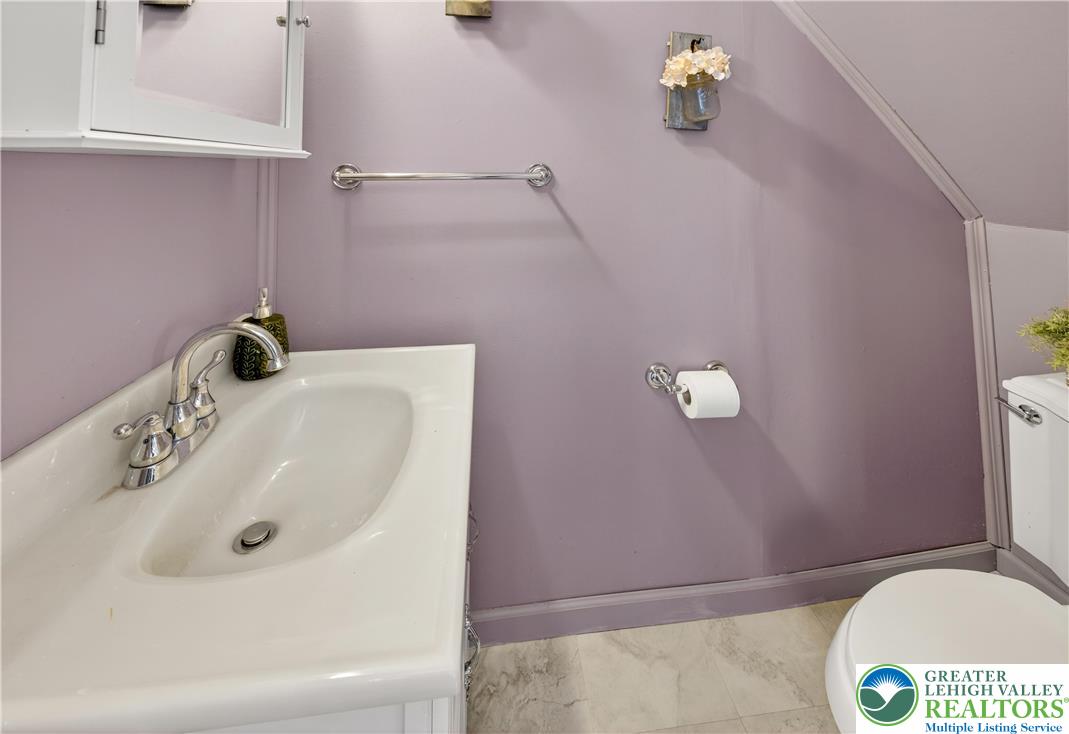 945 Main Street Bethlehem, PA 18018 - Photo 30 of 75 a bathroom with a sink