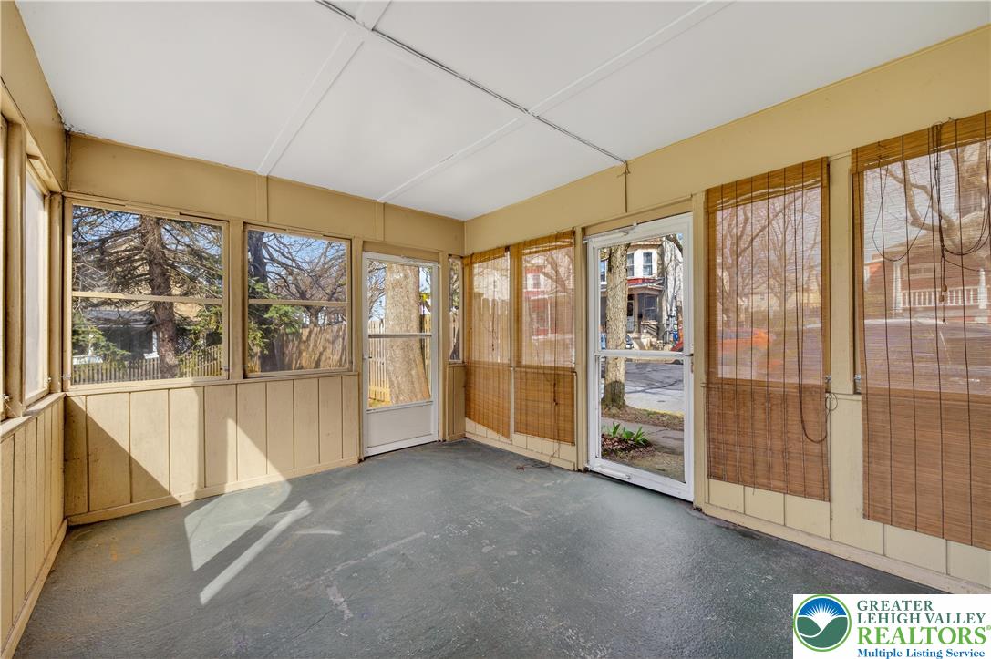 945 Main Street Bethlehem, PA 18018 - Photo 33 of 75 a view of an empty room with a sliding door