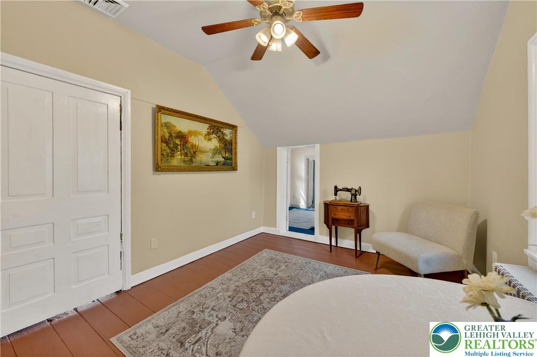 945 Main Street Bethlehem, PA 18018 - Photo 44 of 75 a bedroom with furniture and a window