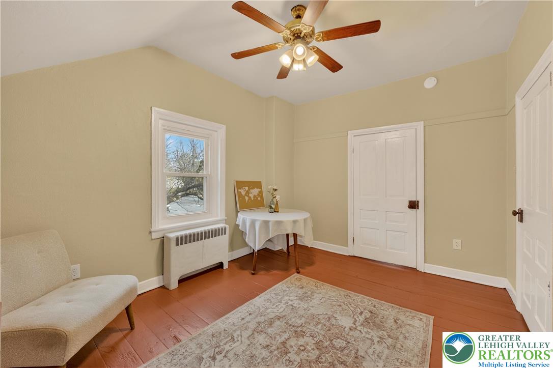 945 Main Street Bethlehem, PA 18018 - Photo 45 of 75 a living room with furniture and a window