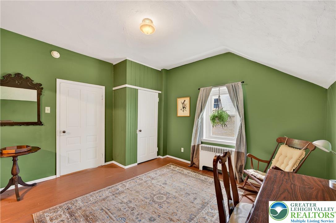 945 Main Street Bethlehem, PA 18018 - Photo 49 of 75 a bedroom with a bed and a dresser