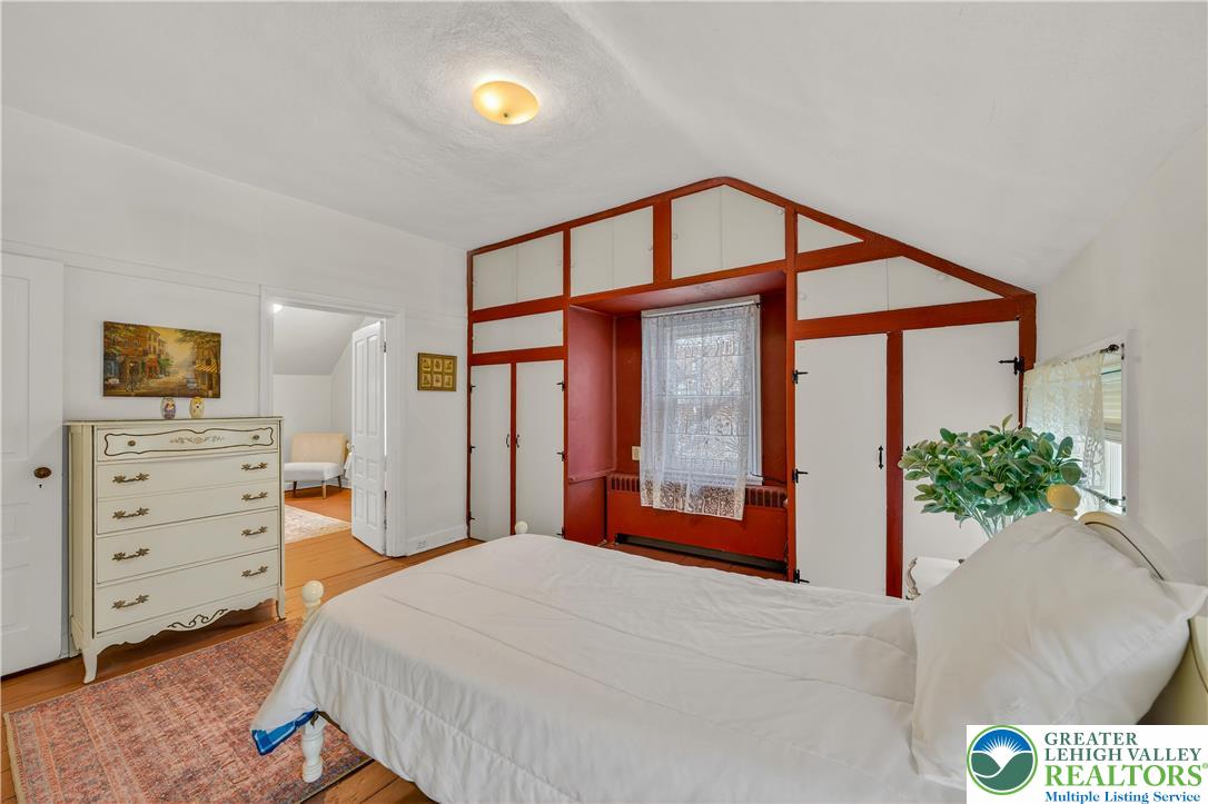 945 Main Street Bethlehem, PA 18018 - Photo 54 of 75 a bedroom with a bed and a large window