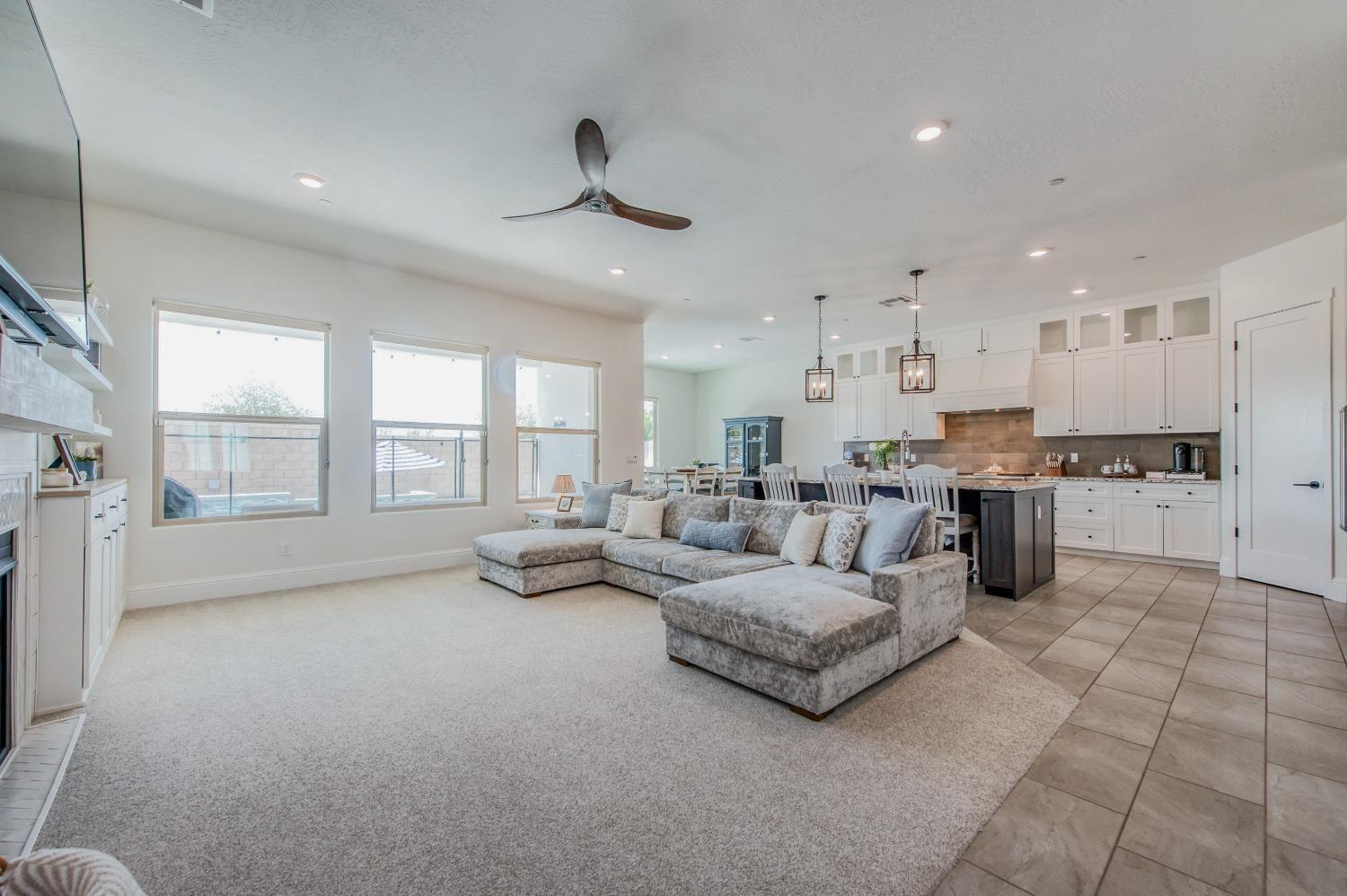 678 Ponderosa Way Madera, CA 93636 - Photo 6 of 38 a living room with furniture and a large window