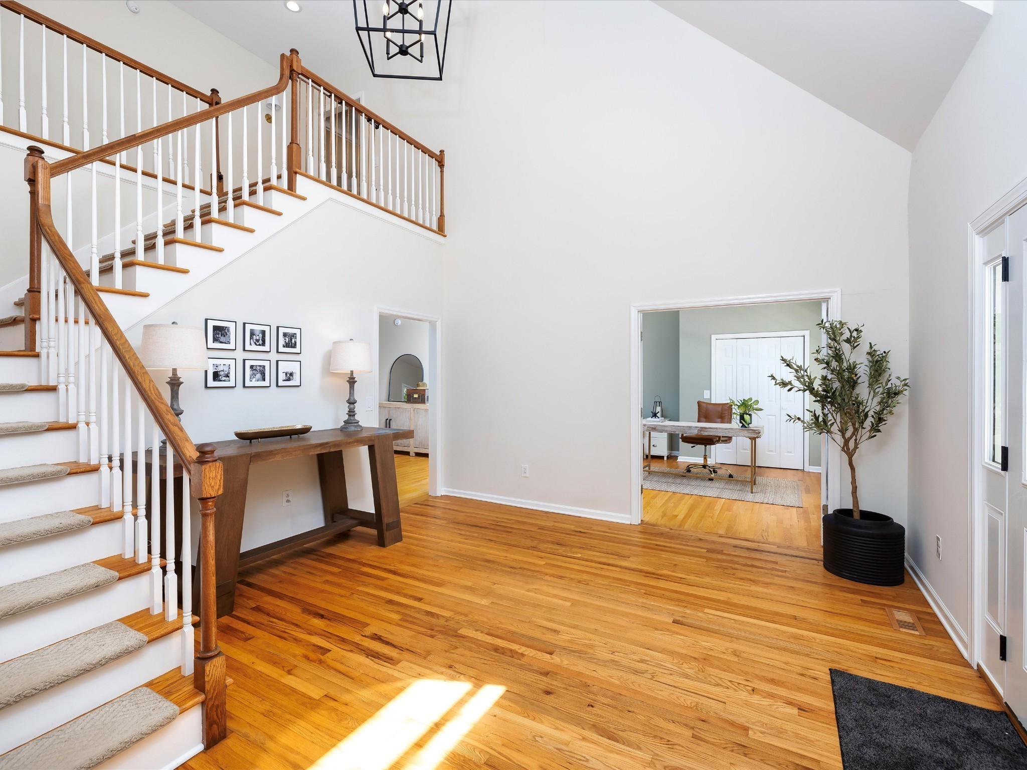 6480 Peytonsville-Arno Road College Grove, TN 37046 - Photo 12 of 96 a view of an entryway with wooden floor and a potted plant