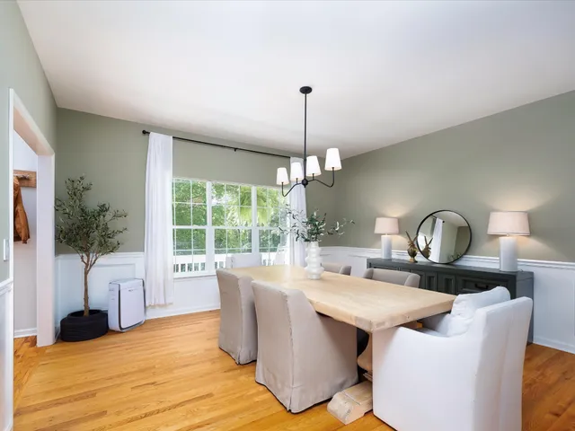 a kitchen with stainless steel appliances granite countertop a refrigerator sink and stove