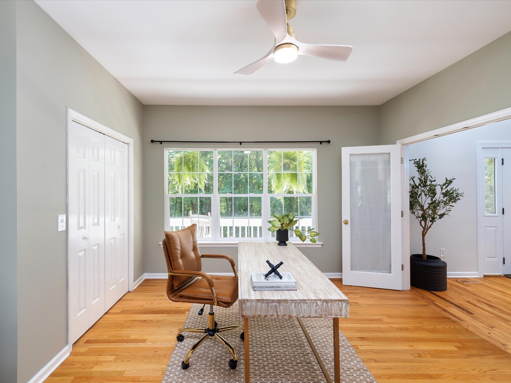 6480 Peytonsville-Arno Road College Grove, TN 37046 - Photo 22 of 96 a living room with furniture floor to ceiling window and potted plants