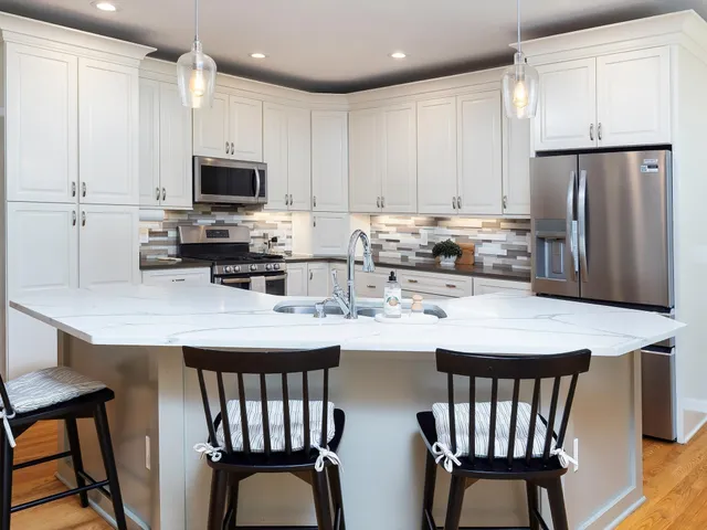 a living room with fireplace furniture and a flat screen tv