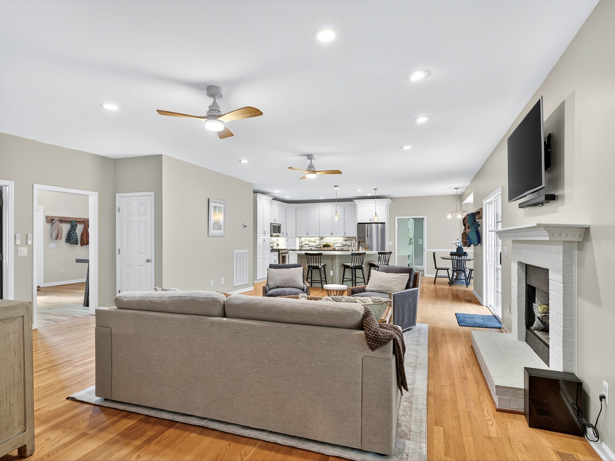 6480 Peytonsville-Arno Road College Grove, TN 37046 - Photo 29 of 96 a living room with furniture a fireplace and a flat screen tv