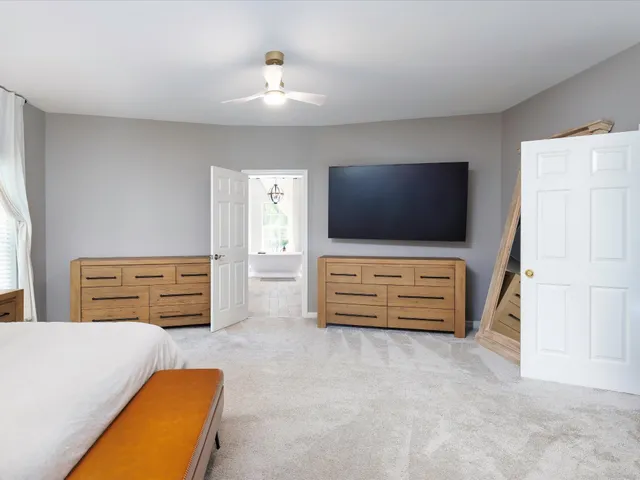 a bathroom with a sink vanity and a mirror