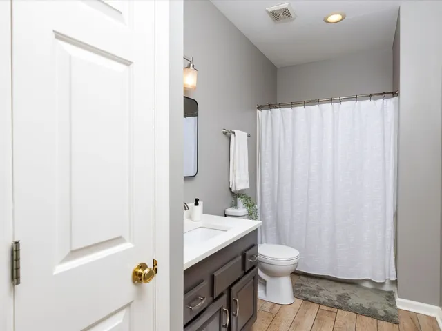 a house view with a sitting space and garden