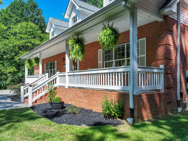 a front view of a house with a garage