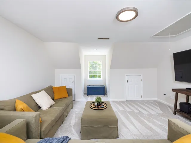 a view of a lush green forest with lots of trees