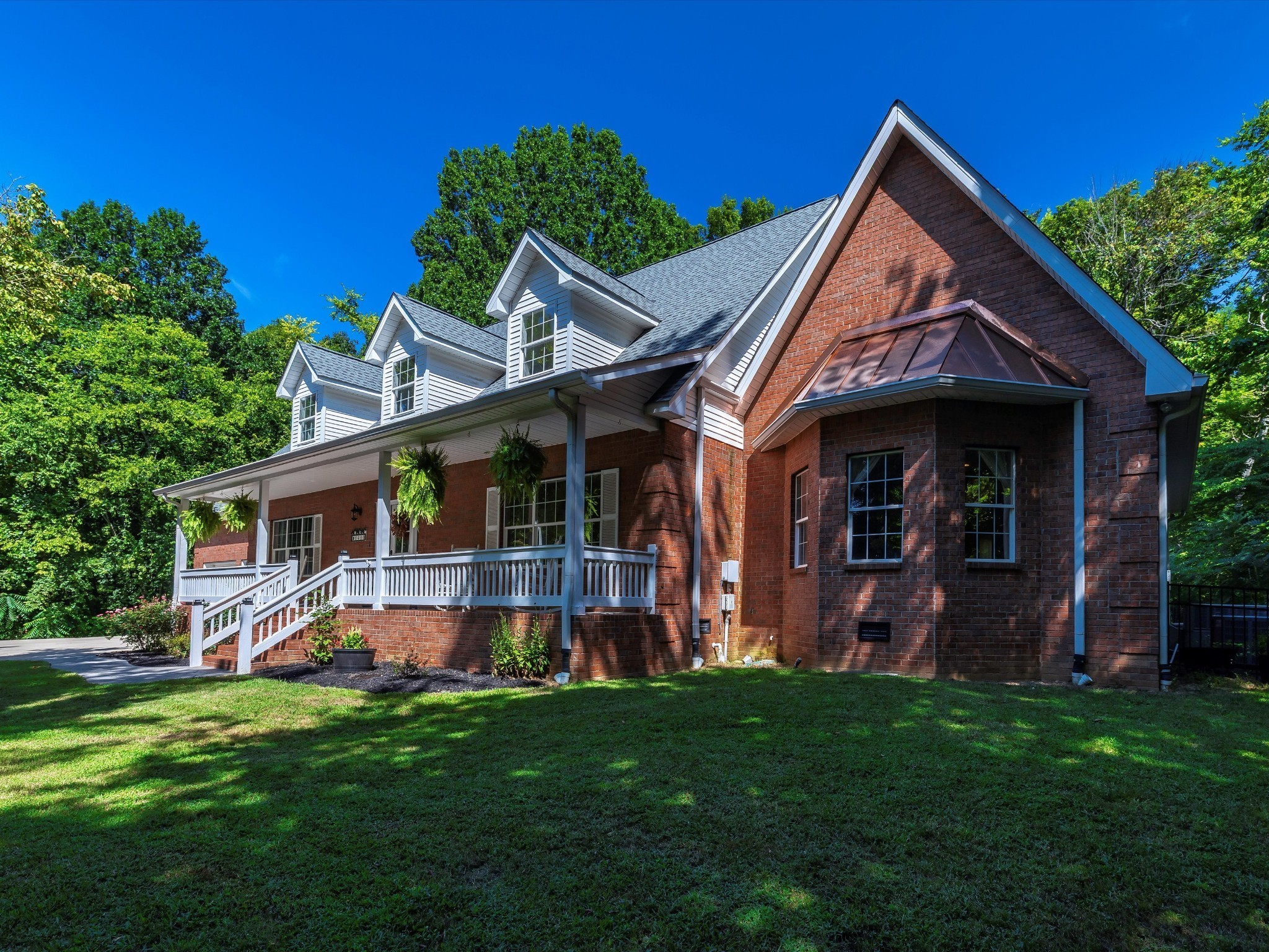 6480 Peytonsville-Arno Road College Grove, TN 37046 - Photo 10 of 96 a view of a house with a yard and potted plants