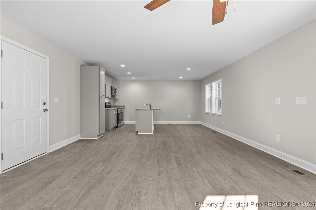 1010 Saunders Avenue Aberdeen, NC 28315 - Photo 12 of 44 a view of an empty room with a window