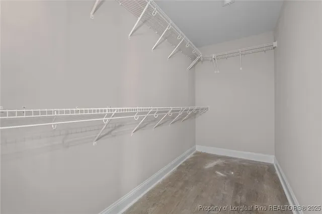 a view of a room with racks on the wall