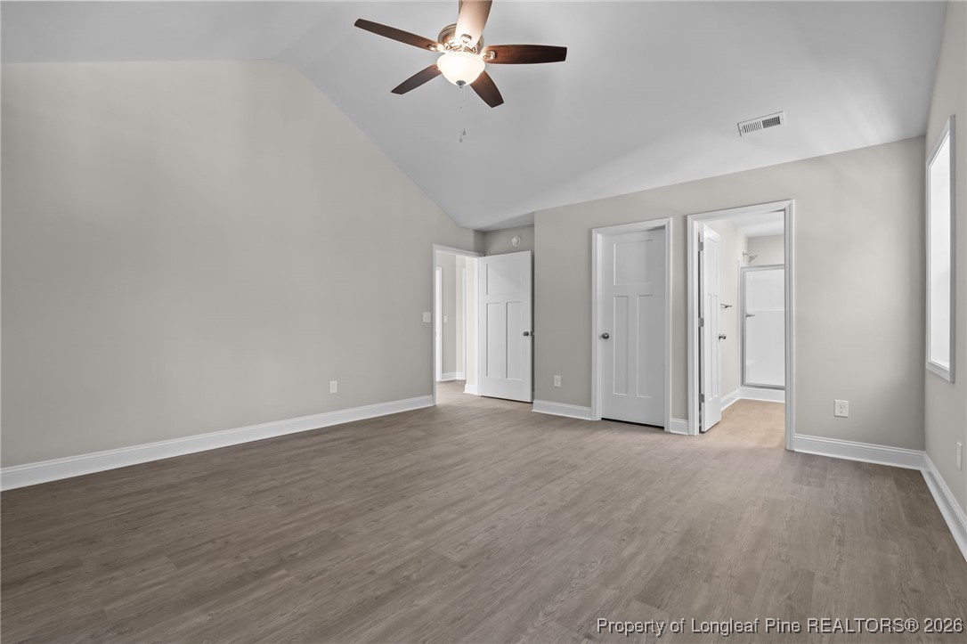 1010 Saunders Avenue Aberdeen, NC 28315 - Photo 33 of 44 a view of an empty room with wooden floor