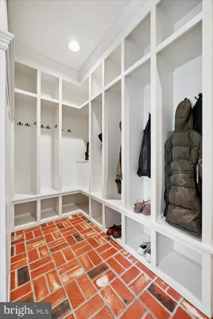 a large kitchen with kitchen island granite countertop a large center island attached withe living room