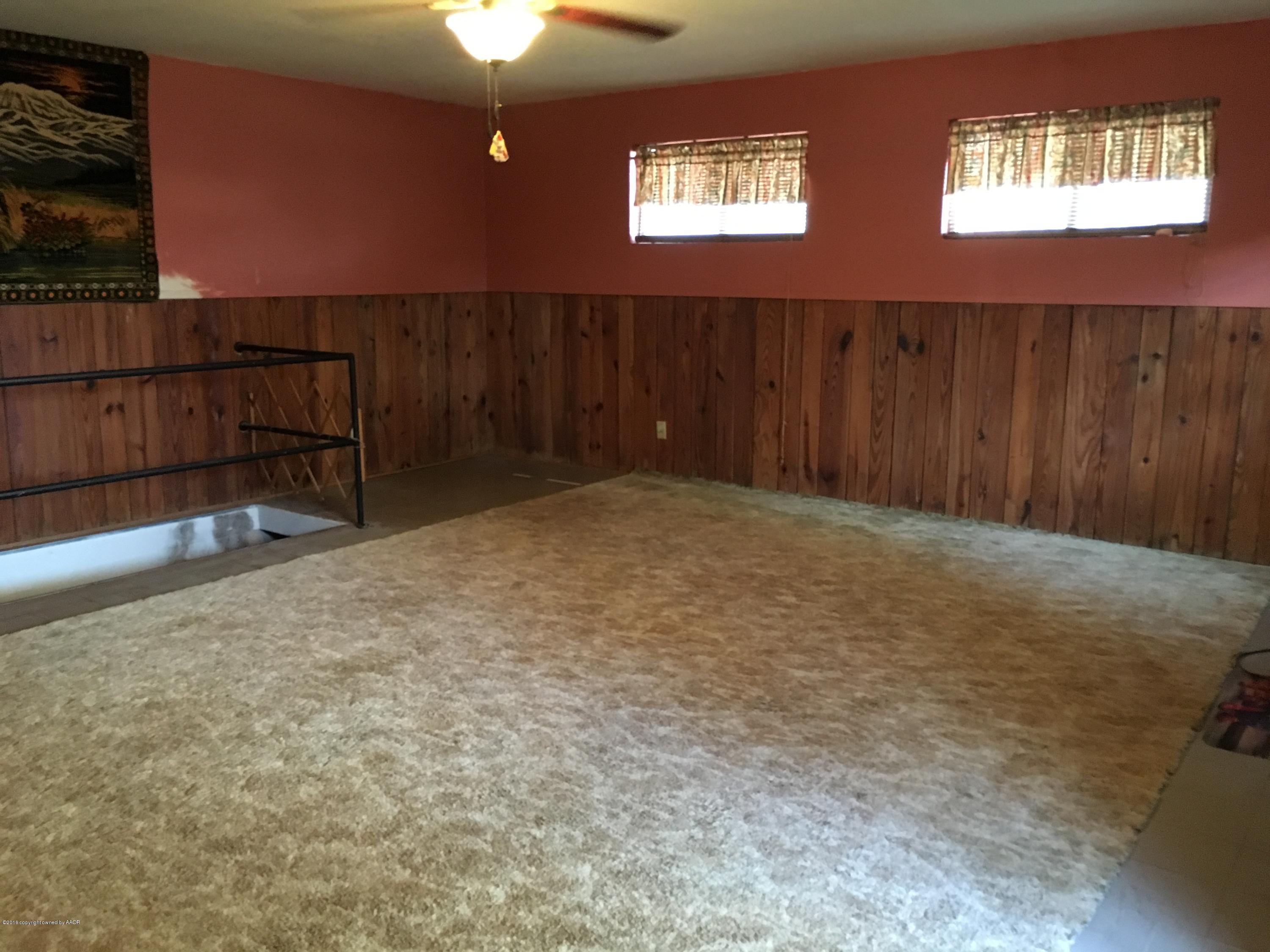 4619 South Lipscomb Street Amarillo, TX 79110 - Photo 3 of 15 a view of an empty room with a window
