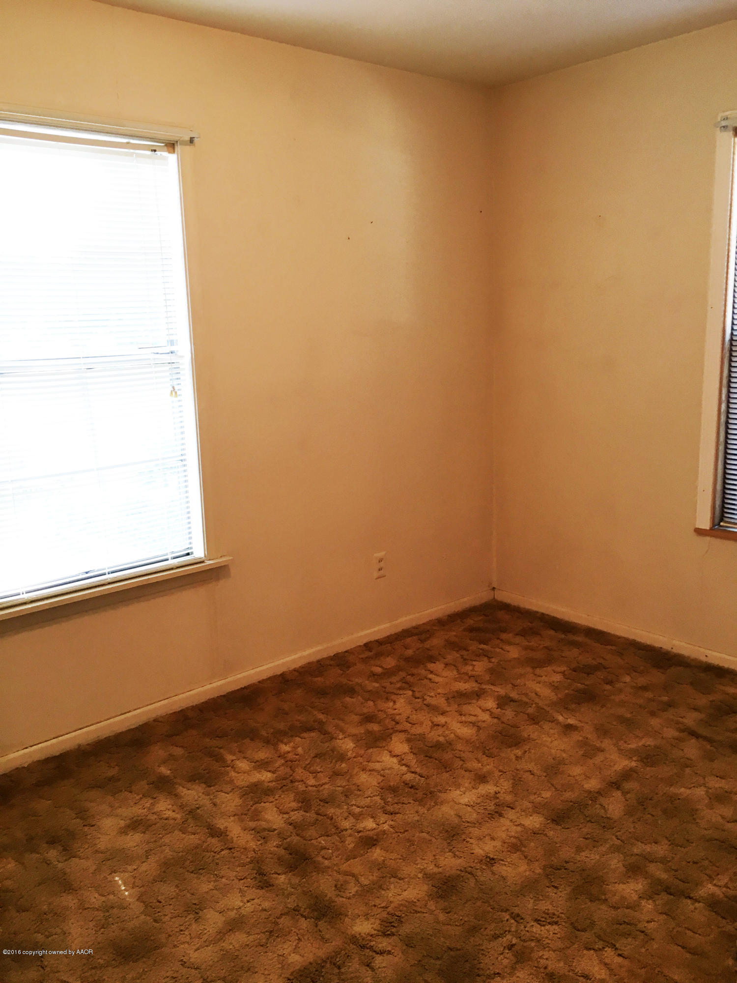 4619 South Lipscomb Street Amarillo, TX 79110 - Photo 8 of 15 a view of empty room with window
