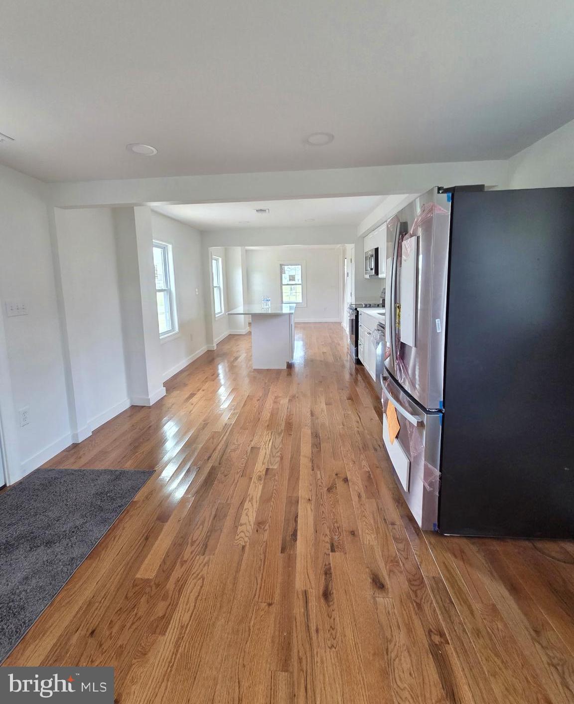 2527 Old House Point Road Fishing Creek, MD 21634 - Photo 13 of 34 a view of a living room with wooden floor