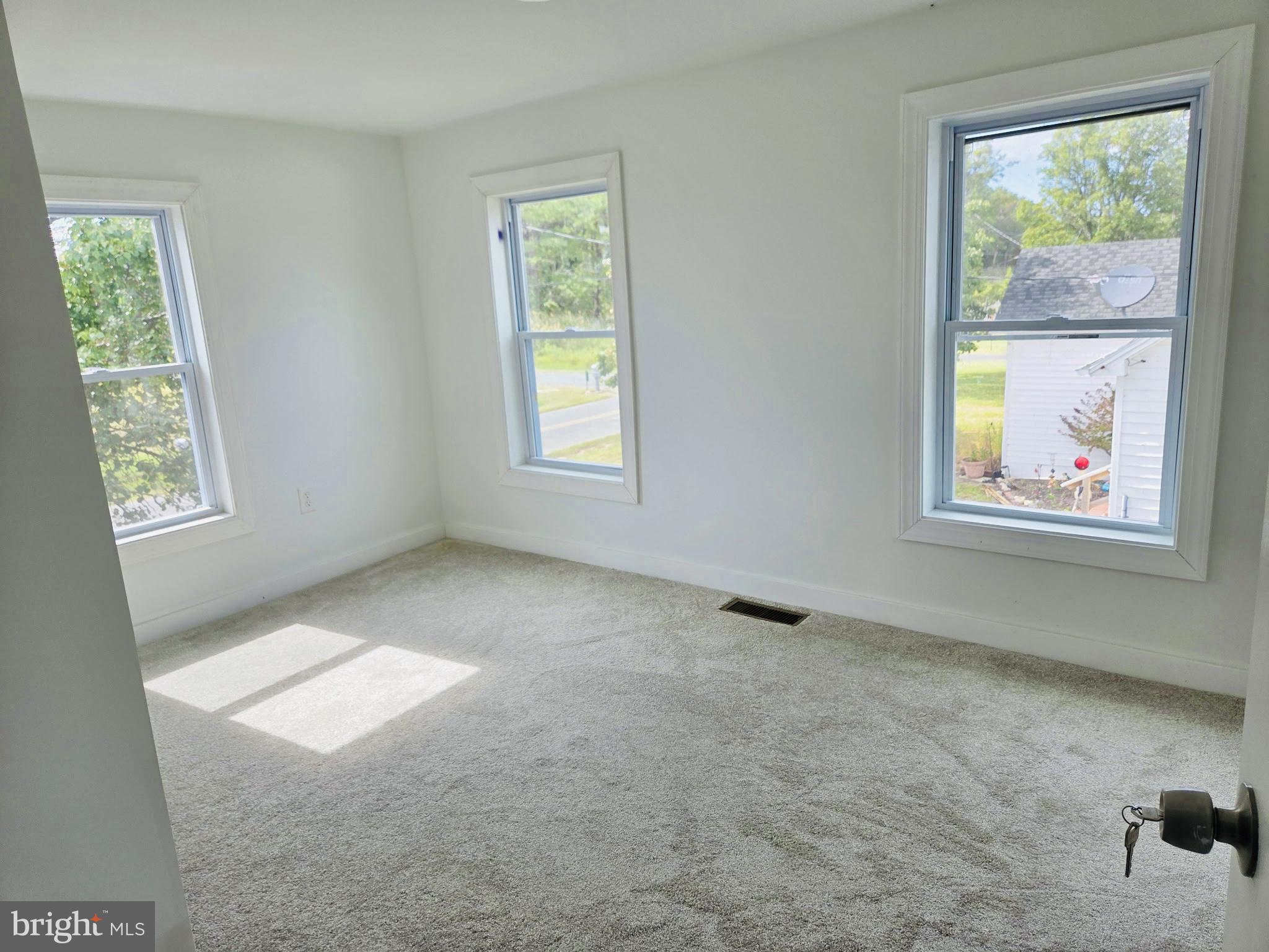 2527 Old House Point Road Fishing Creek, MD 21634 - Photo 24 of 34 an empty room with windows