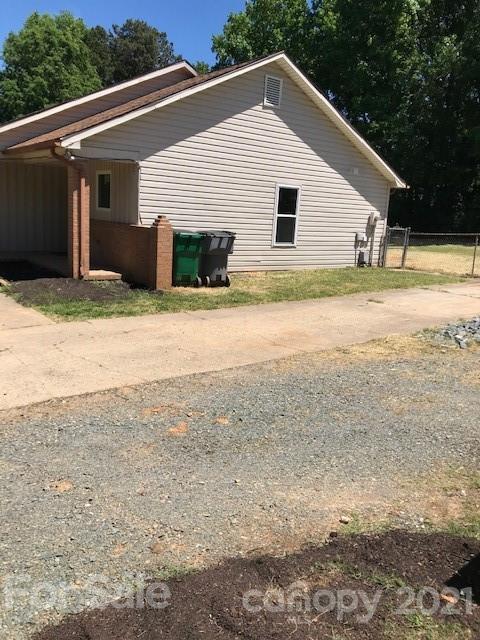 6718 Idlewild Road Charlotte, NC 28212 - Photo 11 of 12 a view of a backyard of the house