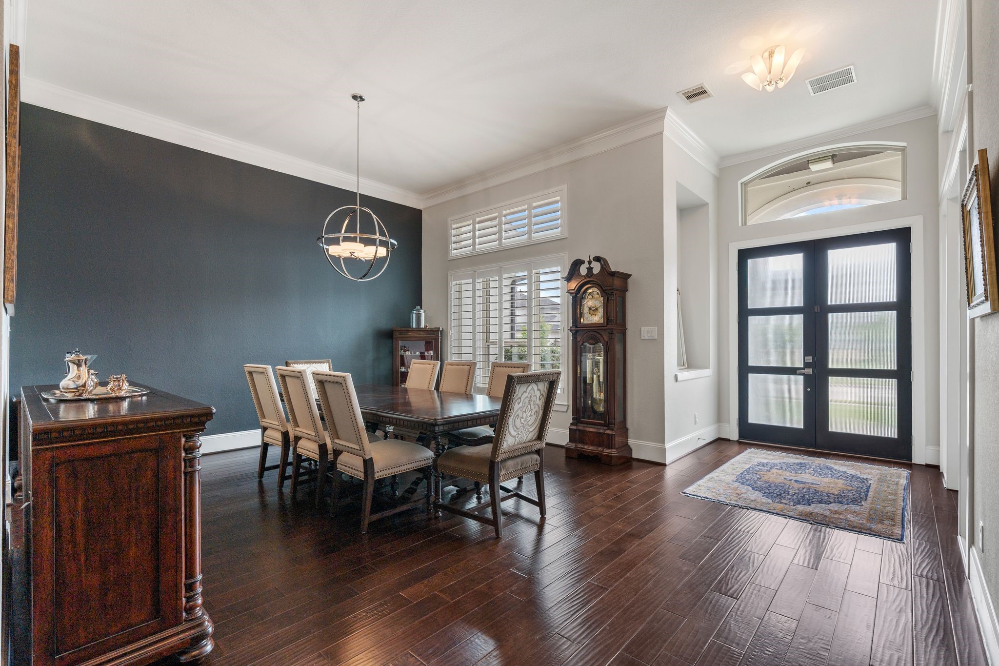 2926 Fairmont Ridge Lane Katy, TX 77494 - Photo 11 of 49 a view of a dining room with furniture and wooden floor
