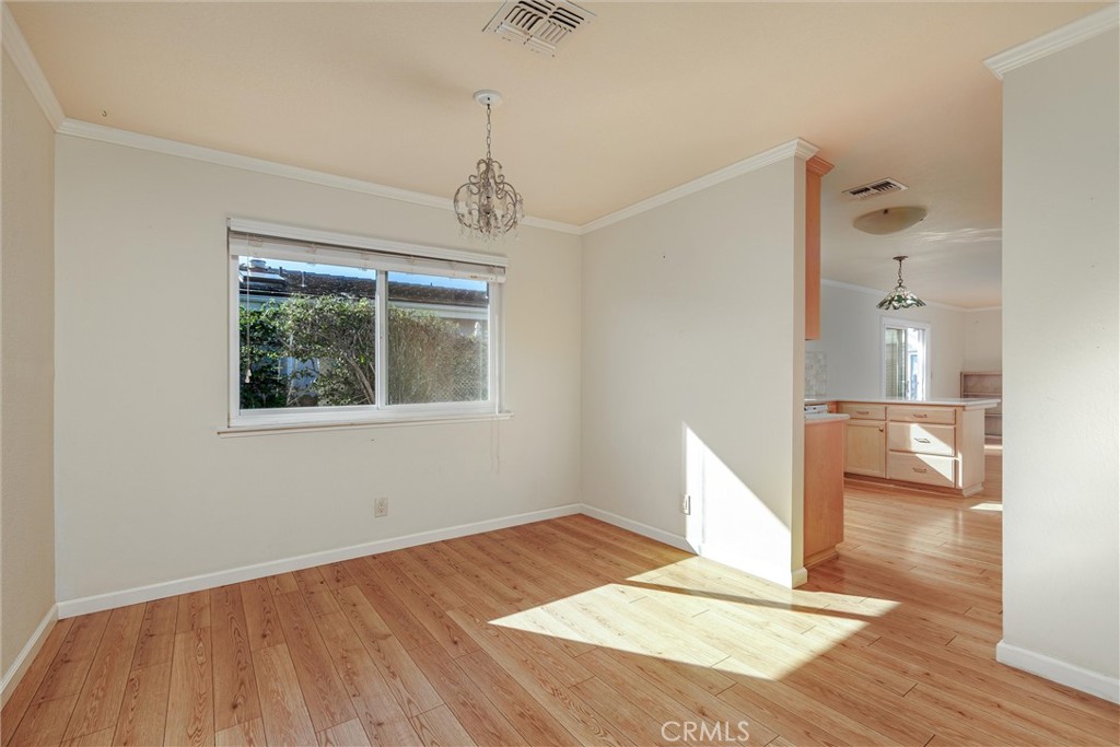 160 Verdon Street Morro Bay, CA 93442 - Photo 9 of 34 a view of an empty room with wooden floor and a window