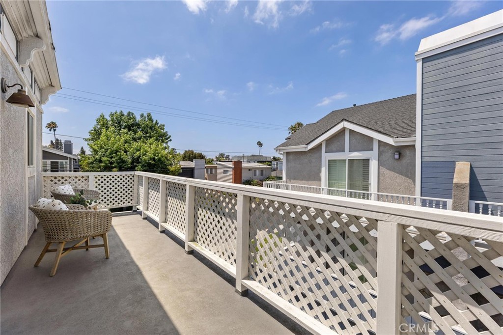 1421 12th Street, Unit 1 Manhattan Beach, CA 90266 - Photo 24 of 36 a balcony with wooden floor