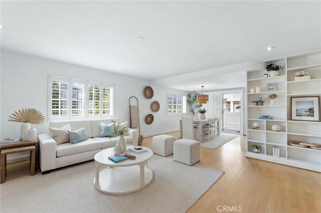 1421 12th Street, Unit 1 Manhattan Beach, CA 90266 - Photo 5 of 36 a living room with furniture and a large window