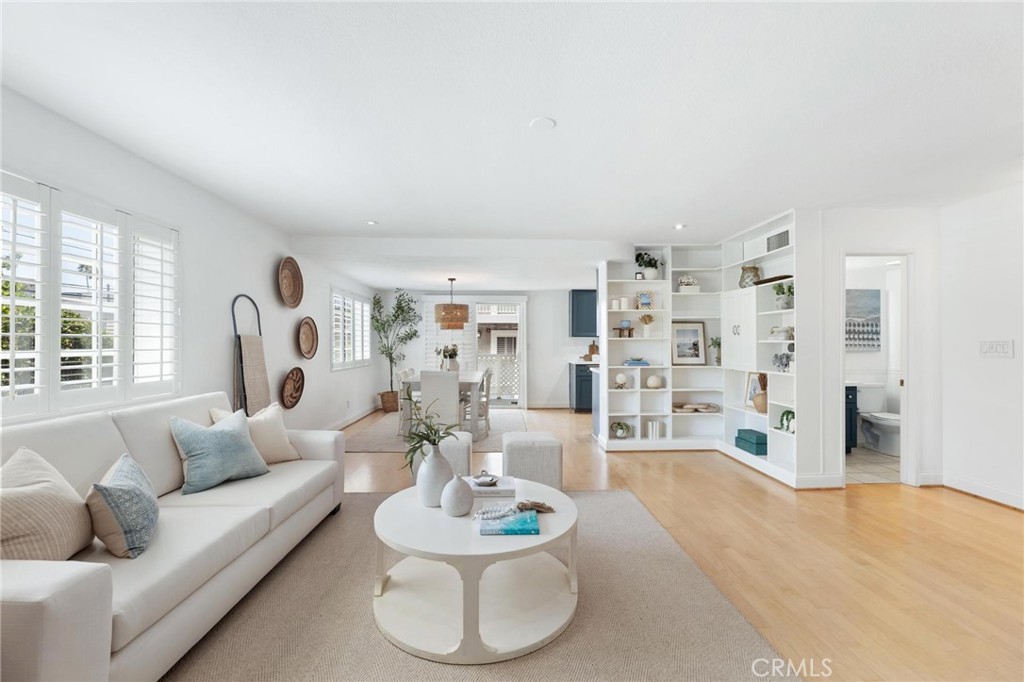 1421 12th Street, Unit 1 Manhattan Beach, CA 90266 - Photo 6 of 36 a living room with furniture and a wooden floor
