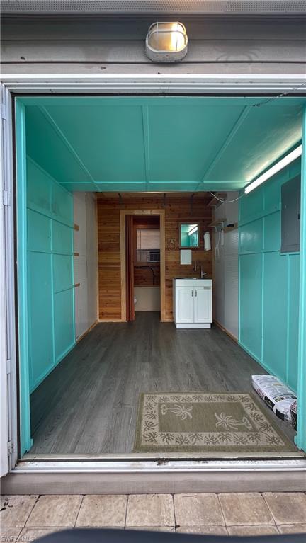 5184 Cypress Trail Resort Circle Fort Myers, FL 33905 - Photo 5 of 5 Garage with wooden walls and electric panel