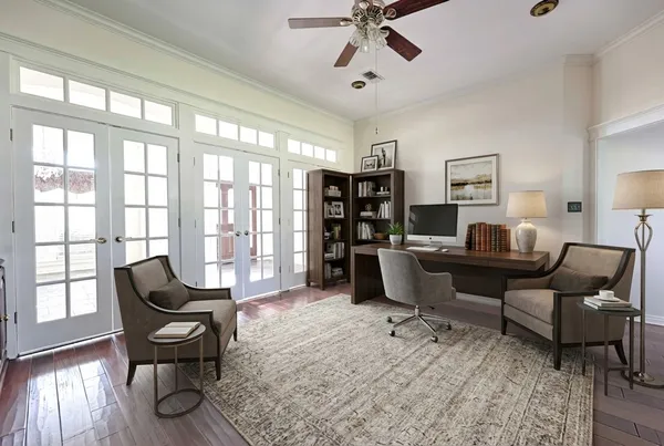 a kitchen with stainless steel appliances granite countertop a sink a stove and a wooden floors