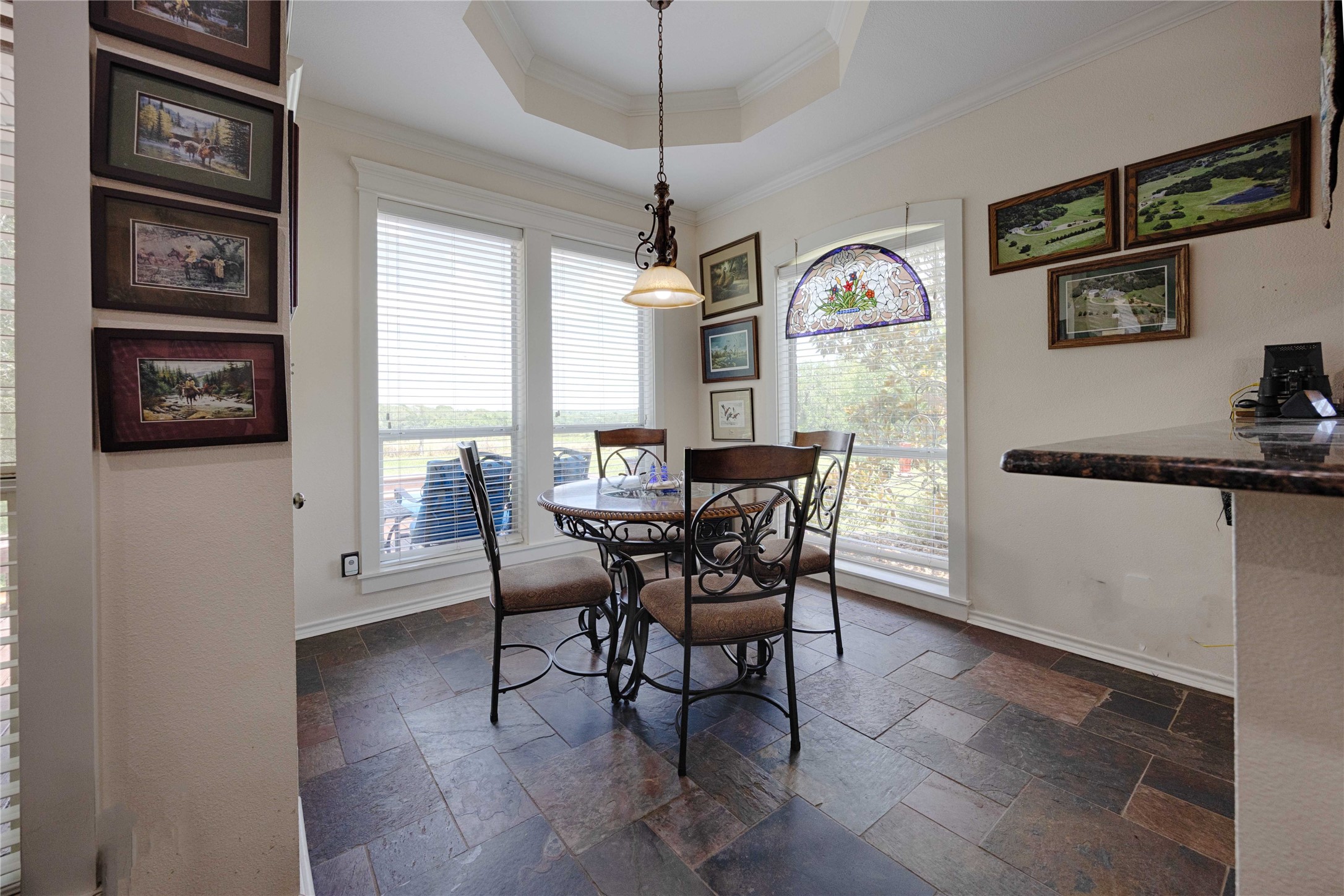 900 Schulze Road Muldoon, TX 78949 - Photo 18 of 47 a view of a dining room with furniture window and wooden floor