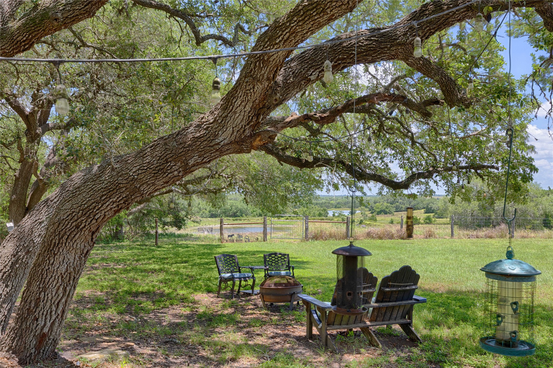 900 Schulze Road Muldoon, TX 78949 - Photo 36 of 47 a view of a garden with lawn chairs