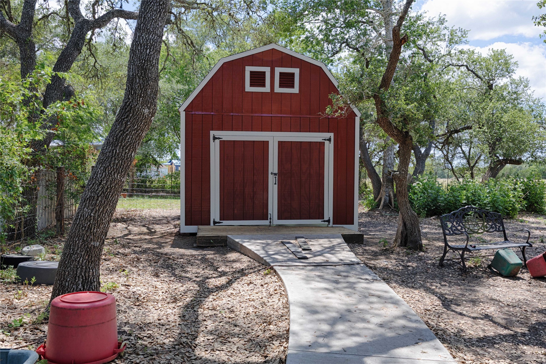 900 Schulze Road Muldoon, TX 78949 - Photo 39 of 47 a front view of a house with a yard