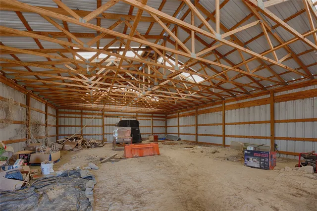 a view of a lake with houses in the back