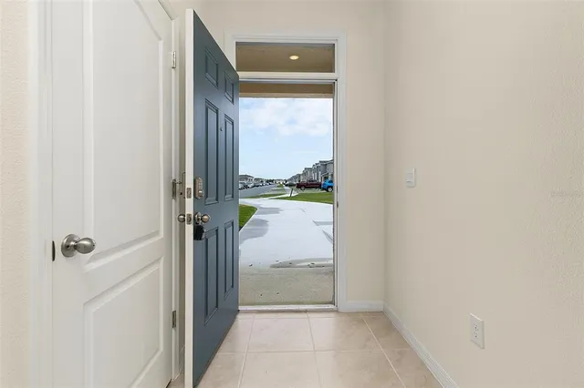 a bathroom with a granite countertop window and a shower
