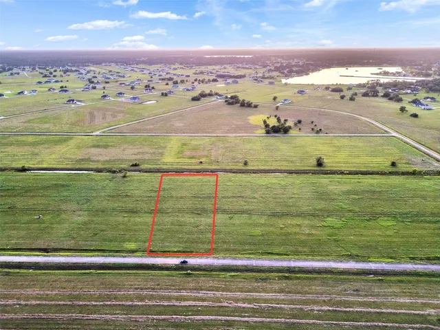 a view of an outdoor space and tennis court