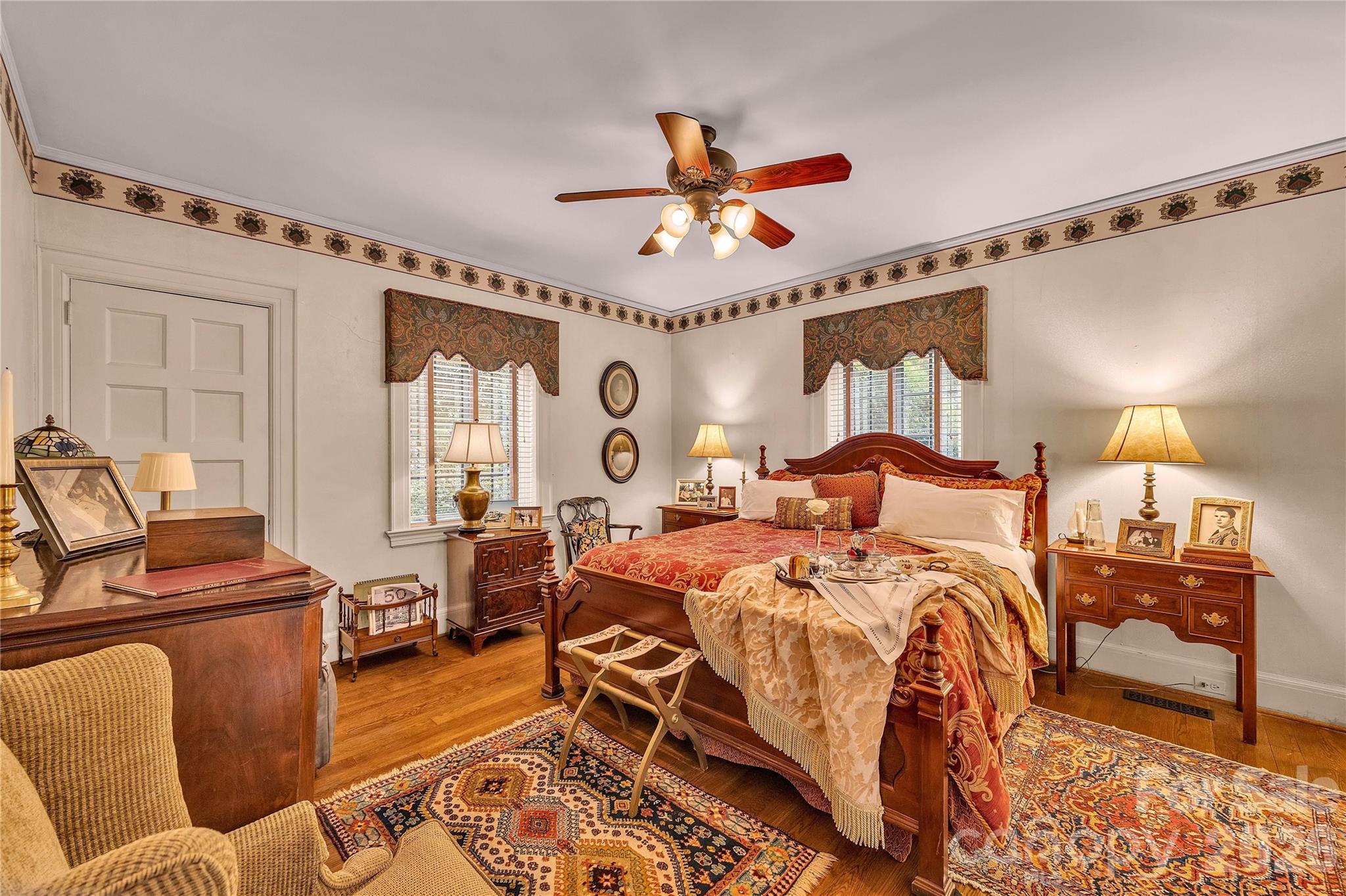 5510 South Main Street Salisbury, NC 28147 - Photo 15 of 43 a bedroom with furniture and wooden floor