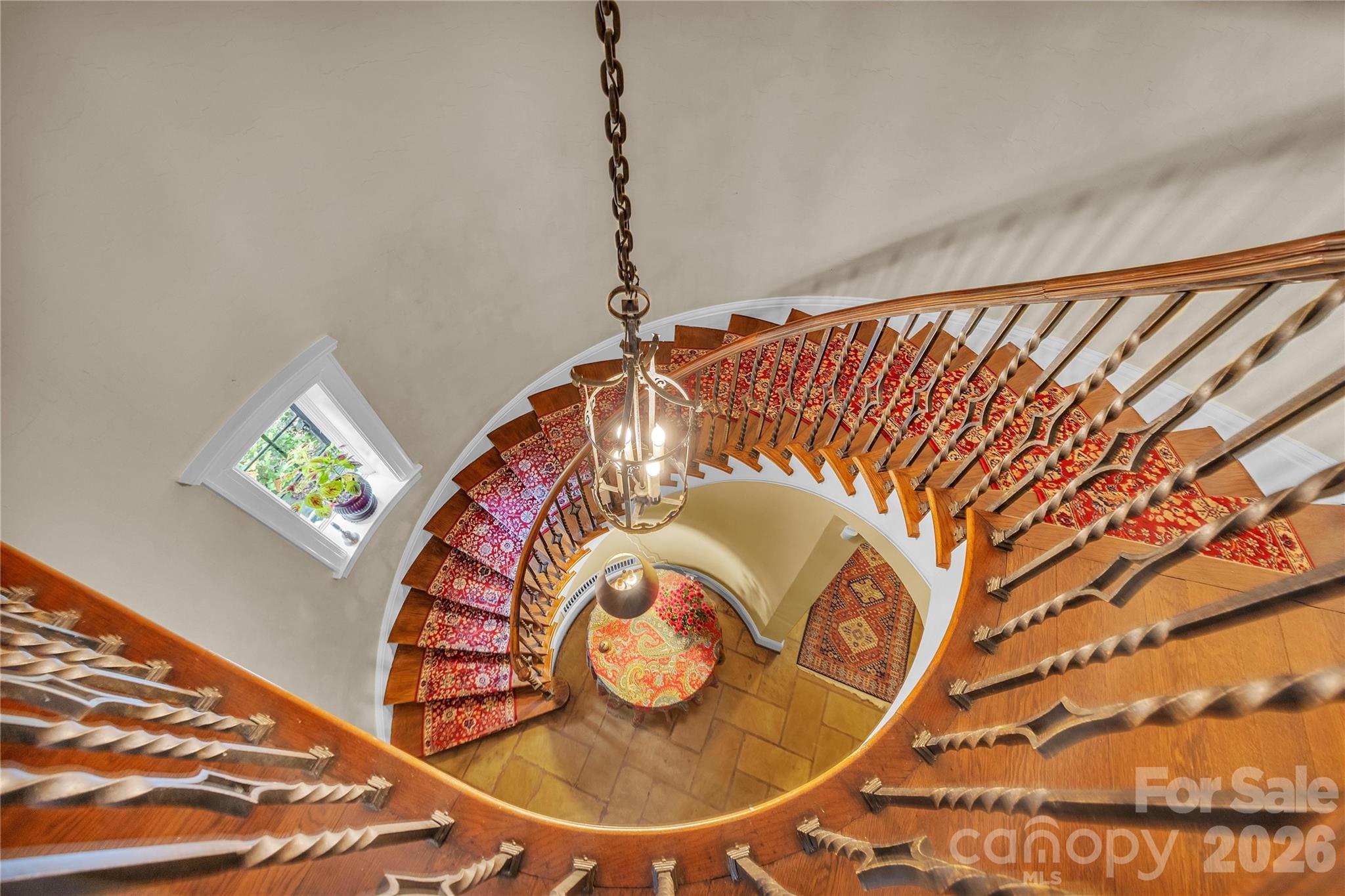 5510 South Main Street Salisbury, NC 28147 - Photo 27 of 43 a view of staircase with a table and a painting on the wall