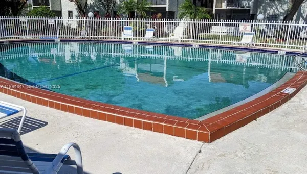 a view of a yard with a lake view