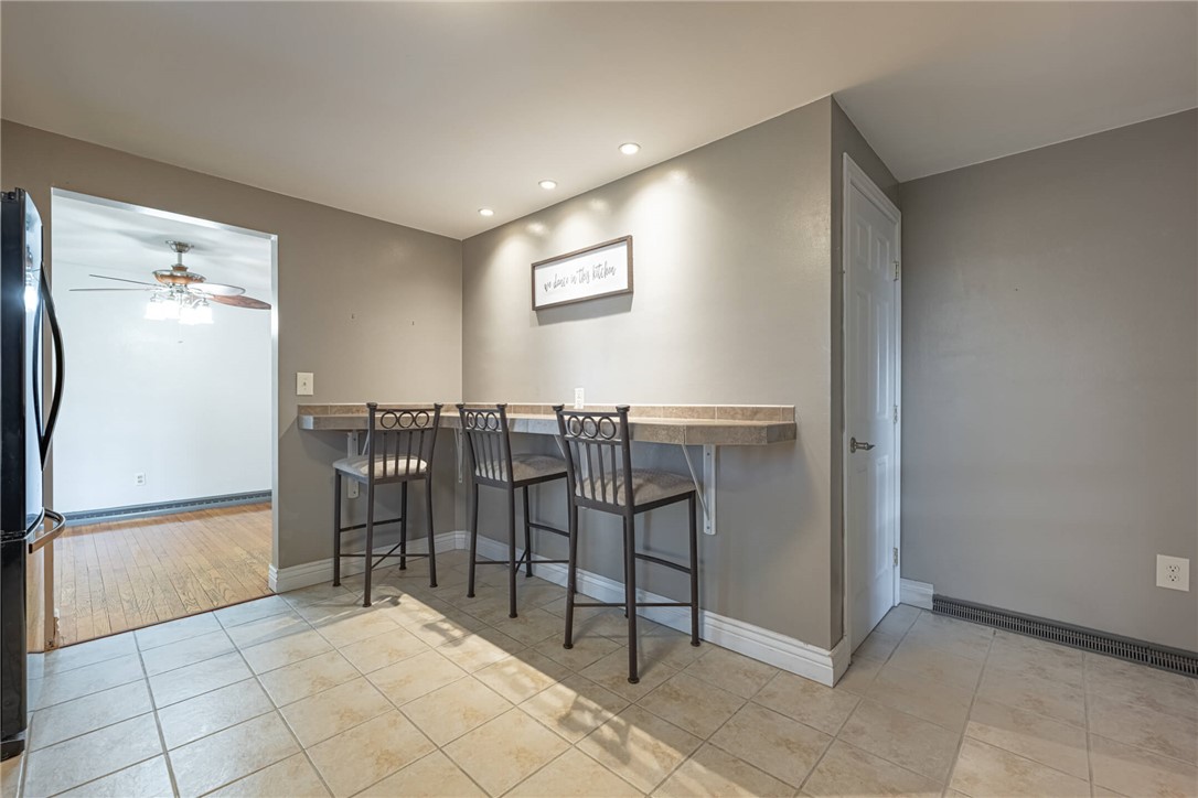 5235 West Ridgewood Road Springfield, OH 45503 - Photo 10 of 32 This inviting kitchen area features practical flooring and bright recessed lighting.
