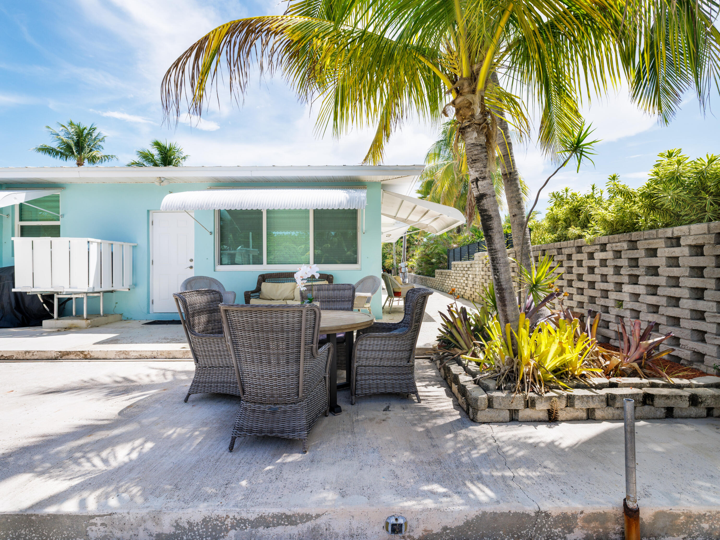 599 30th Street Marathon, FL 33050 - Photo 12 of 43 a view of a house with backyard and sitting area