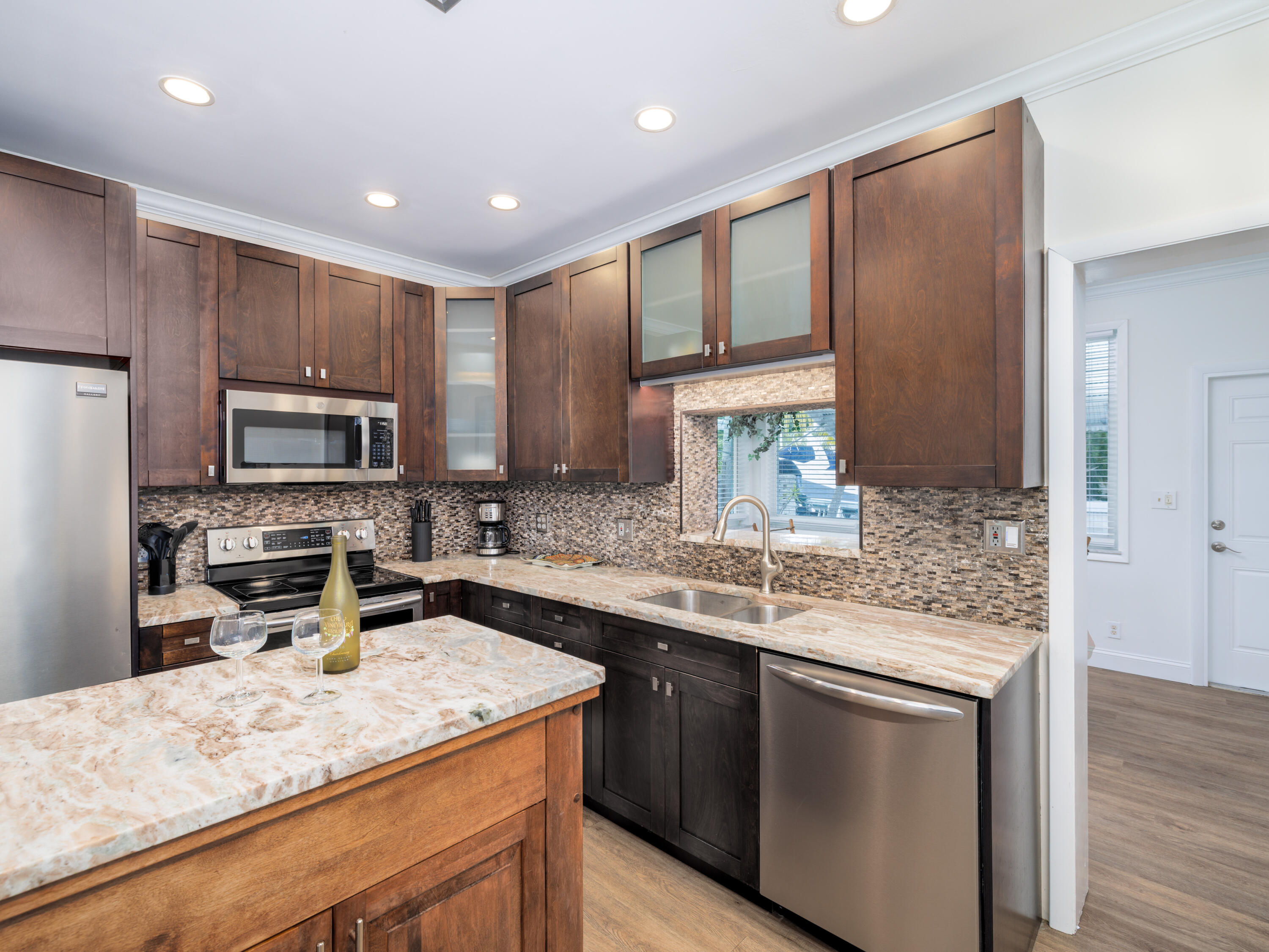 599 30th Street Marathon, FL 33050 - Photo 14 of 43 a kitchen with a sink stove and refrigerator