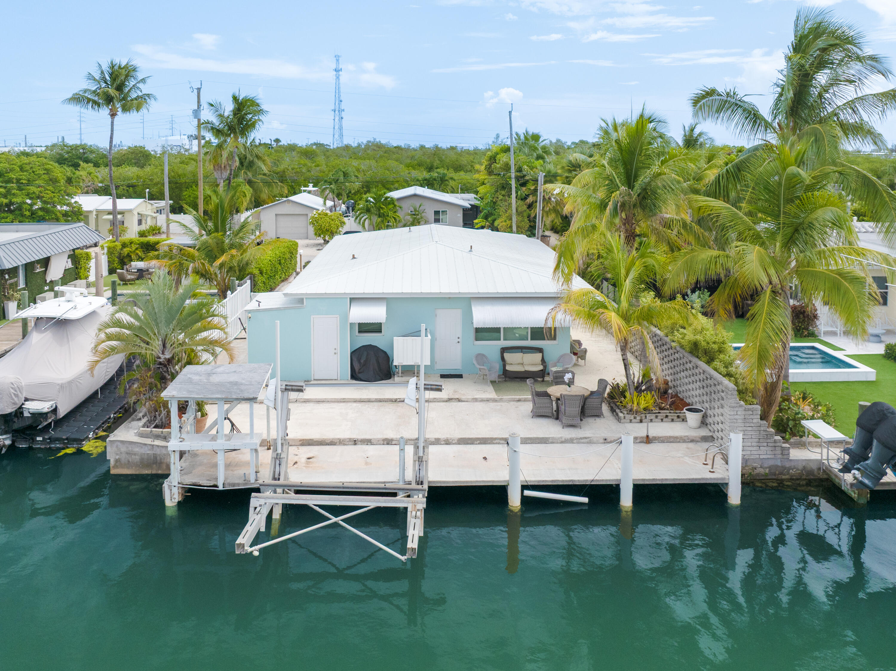 599 30th Street Marathon, FL 33050 - Photo 32 of 43 a view of a house with a yard porch and sitting area