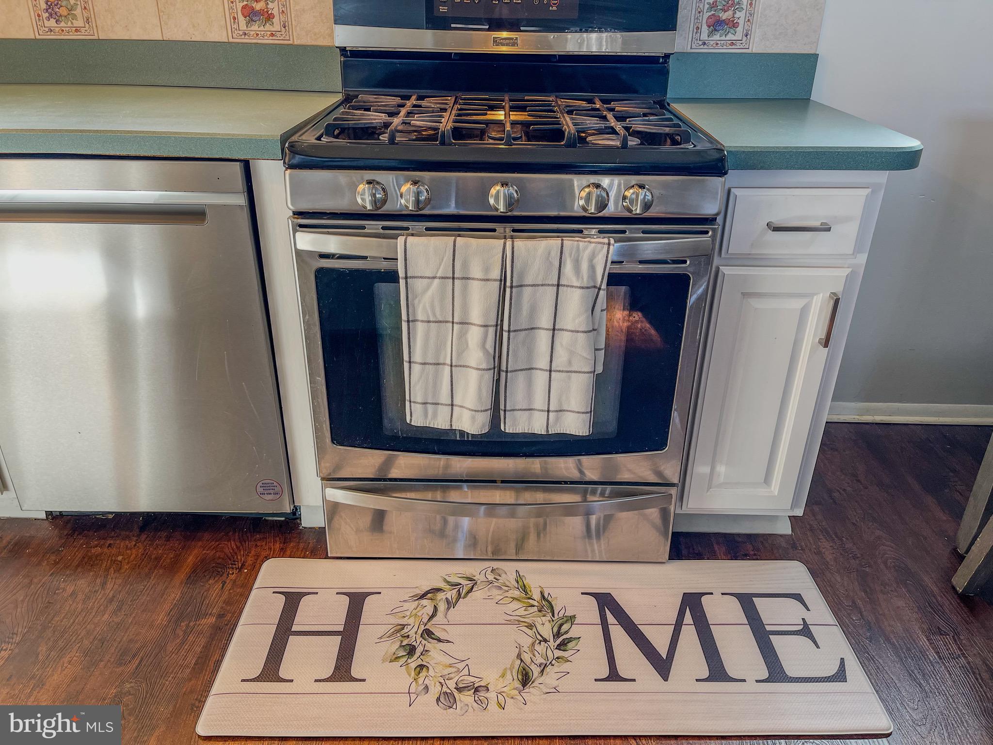 3445 Fitler Street Philadelphia, PA 19114 - Photo 13 of 32 a view of washer and dryer with wooden floor