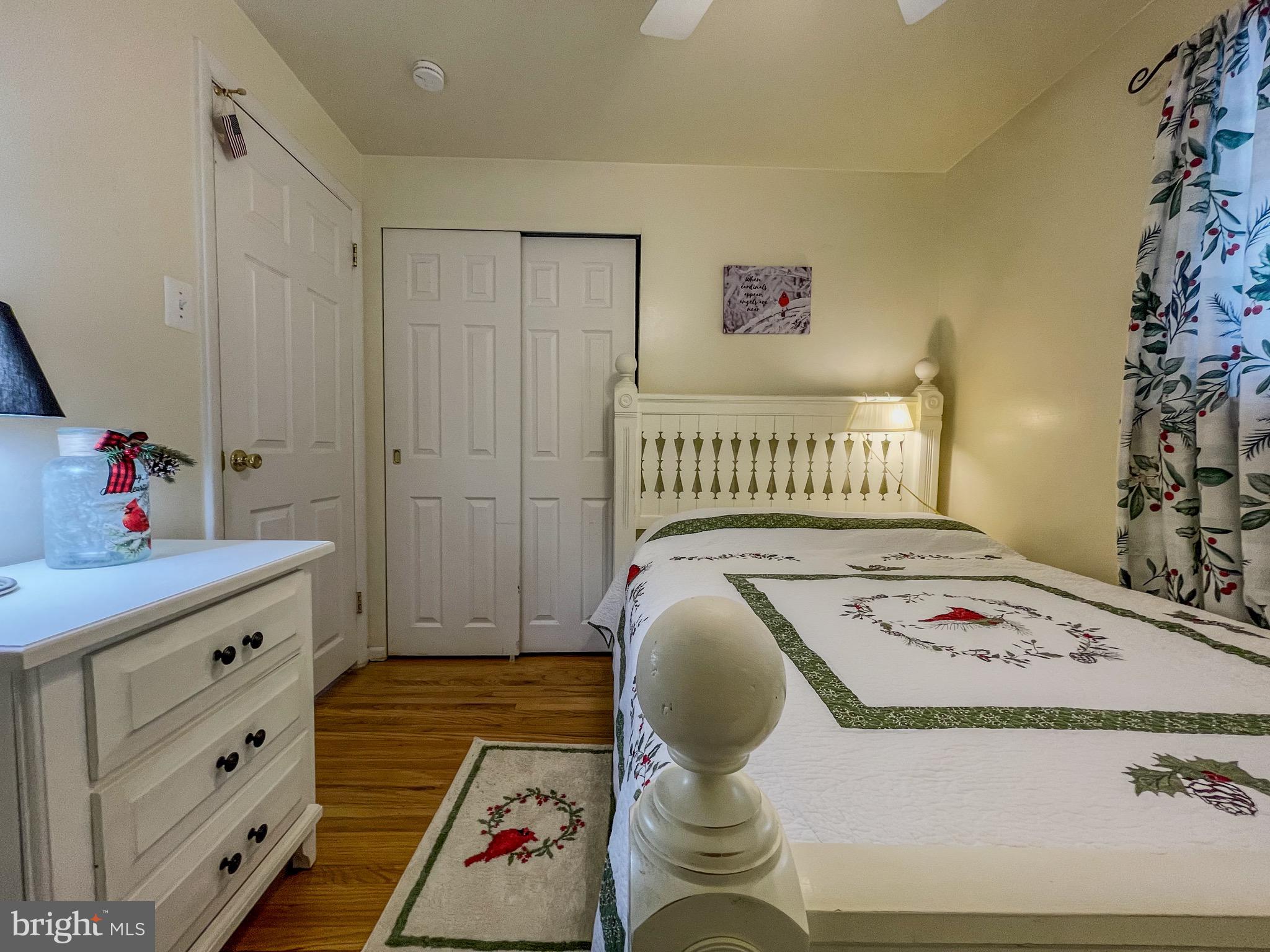 3445 Fitler Street Philadelphia, PA 19114 - Photo 21 of 32 a bedroom with a bed and wooden floor