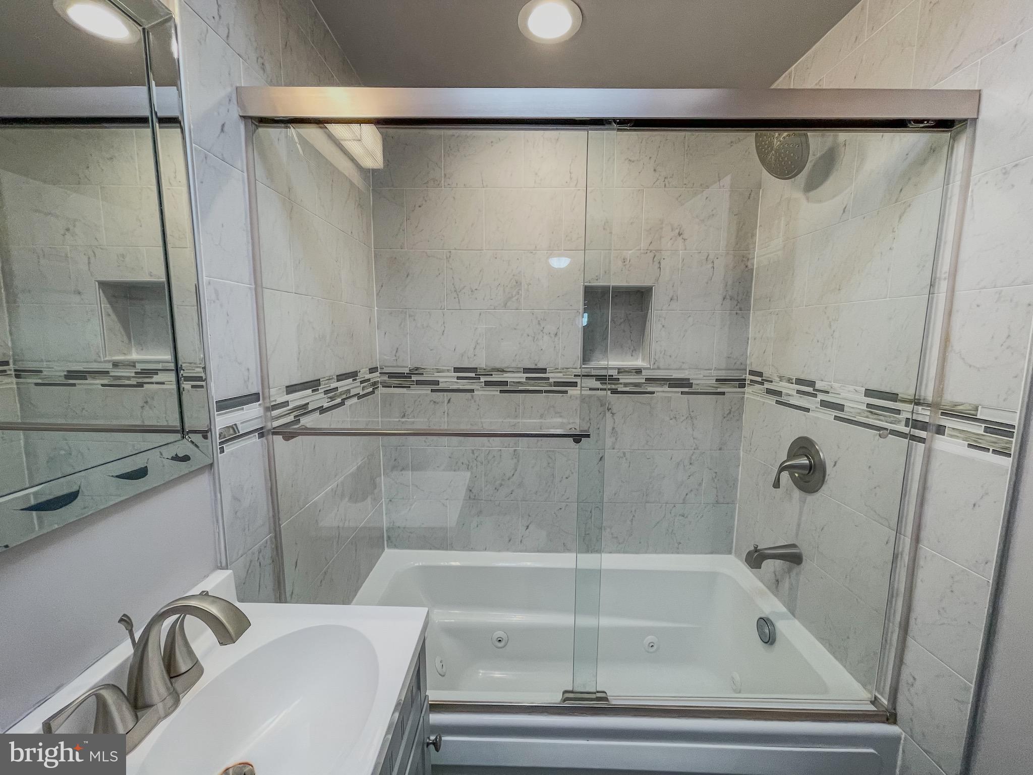 3445 Fitler Street Philadelphia, PA 19114 - Photo 23 of 32 a bathroom with a shower and a sink