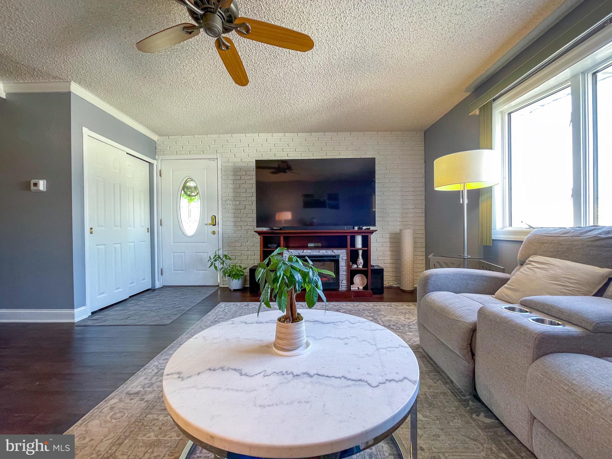 3445 Fitler Street Philadelphia, PA 19114 - Photo 4 of 32 a living room with furniture and a potted plant
